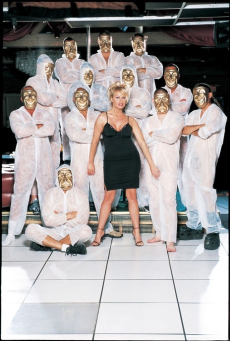 Busty tranny Barbie Woods services group of cowardly men in masks in blowbang