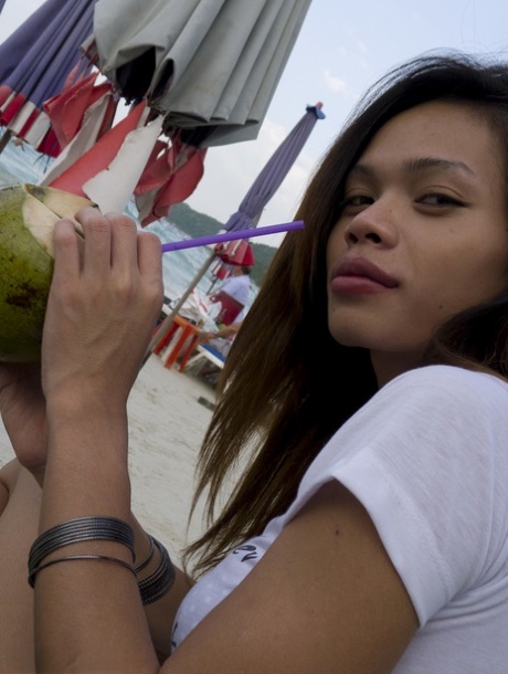 Lovely ladyboy with a pair of sexy tits Wicky getting ready for the beach