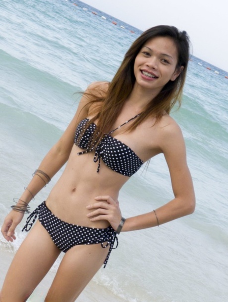 Lovely ladyboy with a pair of sexy tits Wicky getting ready for the beach