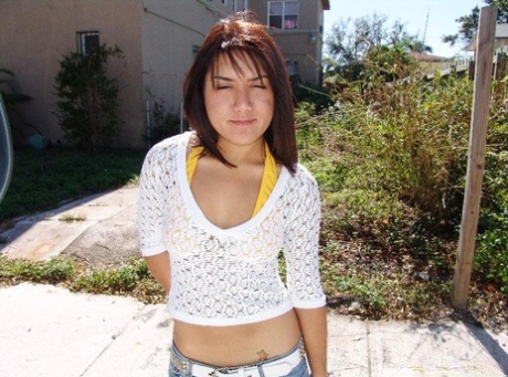 Cute Latina girl Vivi gets her natural tits sprayed with a warm load