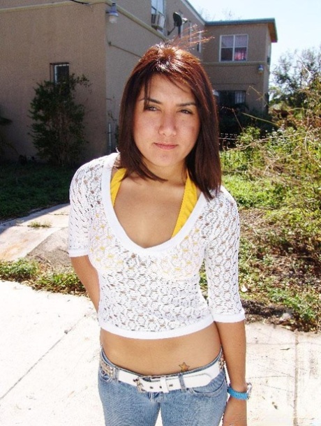 Cute Latina girl Vivi gets her natural tits sprayed with a warm load