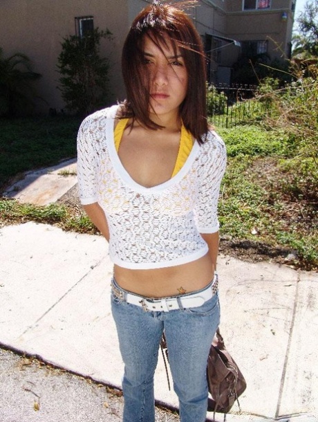 Cute Latina girl Vivi gets her natural tits sprayed with a warm load