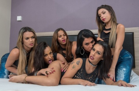 Hot NicolLe Bittencourt poses together with four other transsexual babes