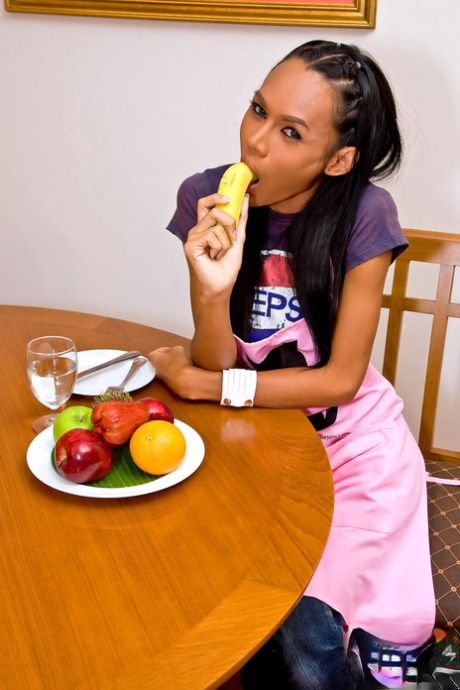 Transsexual housewife Mint fucking a banana and donut in the kitchen