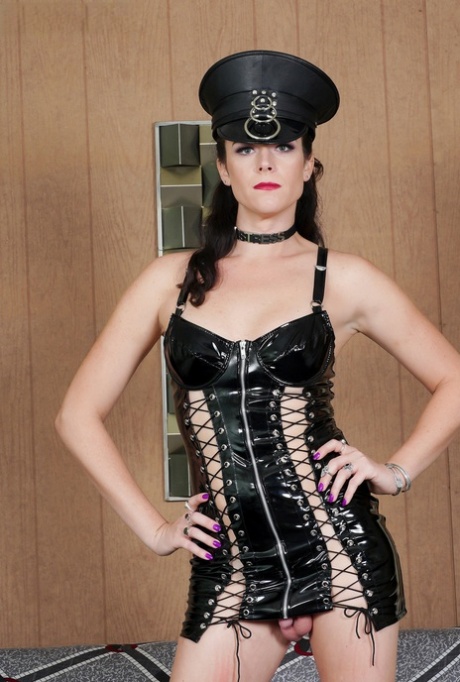 shapely shemale in a latex outfit Kendall Penny flaunts her dick in a solo