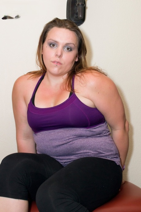 Chubby shemale Misha Malice shows her puffy nipples and her small dick