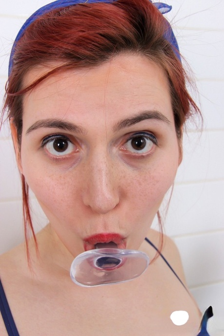 Short-haired shemale Korra Del Rio toying her big ass in the shower