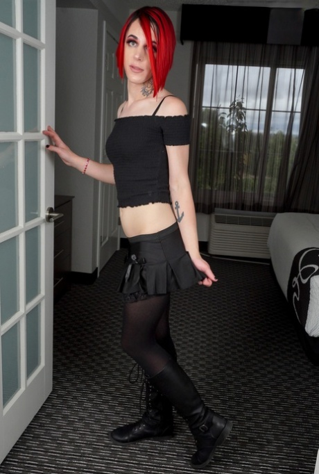 Hot redheaded shemale Scarlet Rose unveils her big ass & jerks off