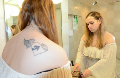 Chubby shemale Yuno smokes & flaunts her big booty in the bathroom