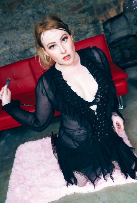 Pretty European shemale Khaleesi Kate shows her tiny boner & sits on a toy