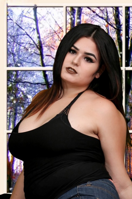 Chubby shemale Veronica Cakes shows off her big tits & her very small dick