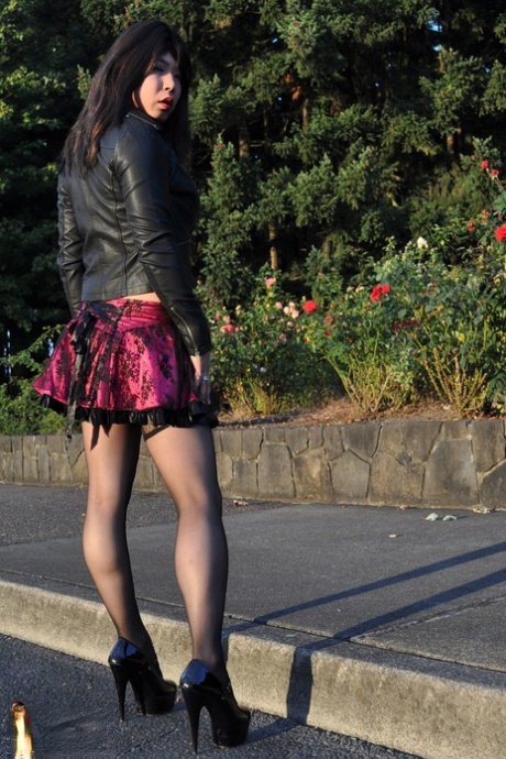 Asian shemale poses in a skirt before revealing her dick & seducing an old man