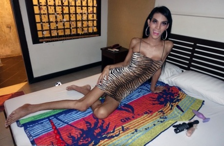Slender shemale masseuse Polla unveils her monster dick & oily asshole