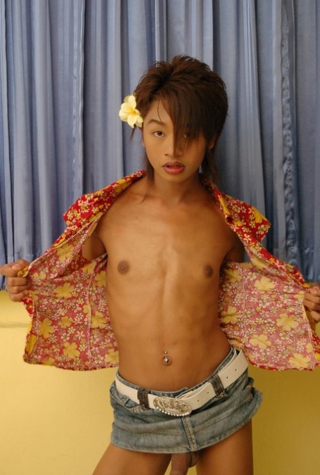 Petite Asian shemale Ment undresses to show her unaroused small dick